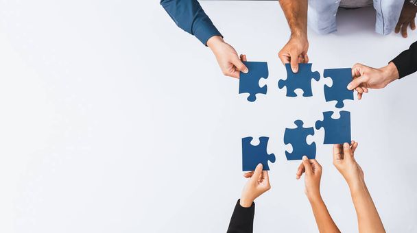 Top view panorama banner of business team joining jigsaw puzzle together over meeting table symbolize business partnership and collective unity teamwork in problem solving solution. Prudent - Photo, Image