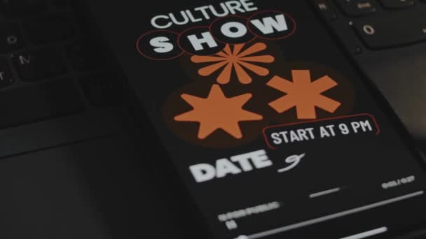 Pop culture. Event show date dedicated to Pop culture. Graphic presentation on smartphone screen. Male hand flapping fingers cheerfully. Entertainment concept. - Footage, Video