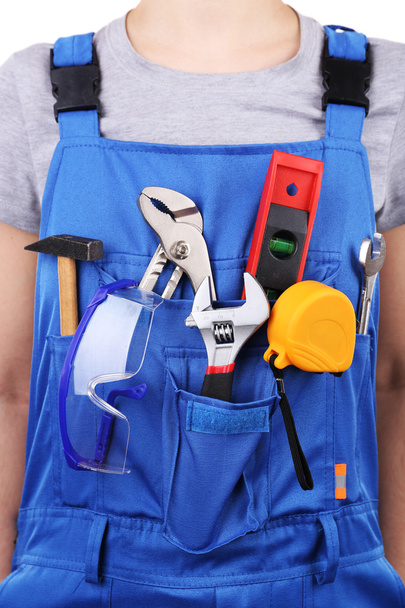 Man in coveralls with tools - Photo, image