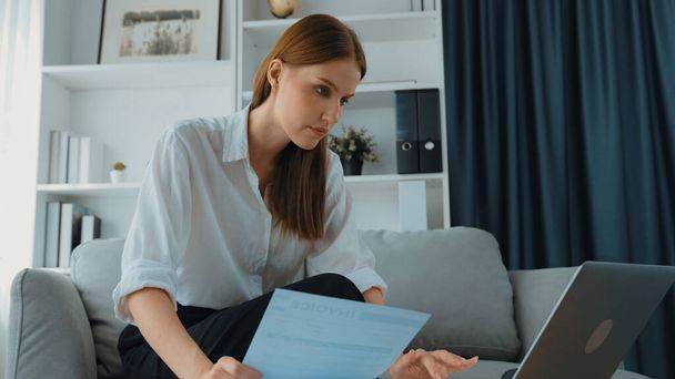 Stressed young woman has financial problems with credit card debt to pay prim from bad personal money and mortgage pay management crisis. Woman worry about financial bankruptcy risk from over spending - Photo, Image