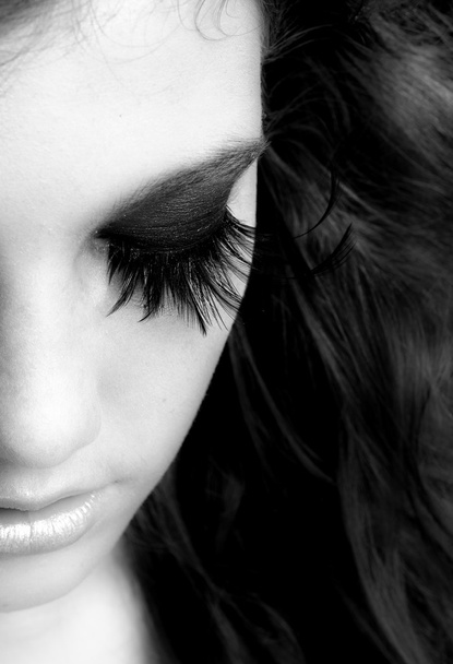 Black and white photo of a girl with extreme makeup - Foto, Imagem