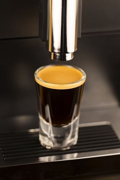 Double espresso shot from exclusive coffee machine - Photo, Image