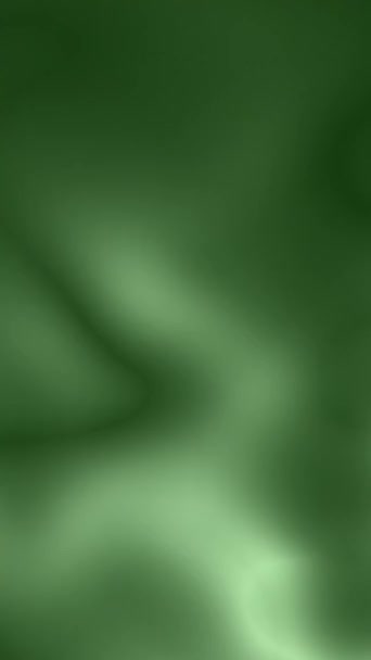 Een groene achtergrond met een wazig beeld. Het beeld heeft een dromerige, etherische kwaliteit - Video