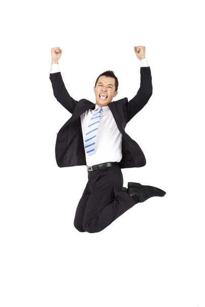 Happy businessman jumping and isolated on white background - Photo, Image