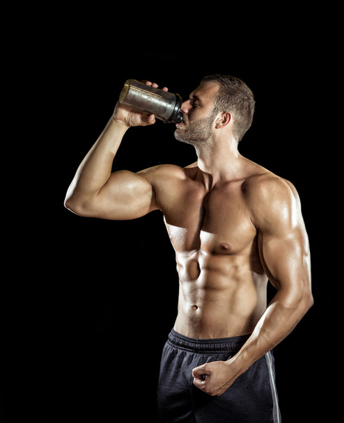 Man drinking protein shake - Foto, immagini