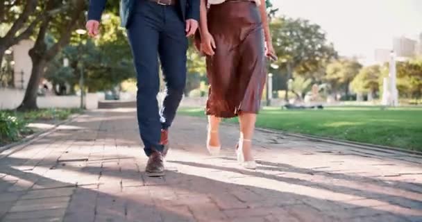 Couple, feet and walking to date, path and nature in park, elegant and closeup up on legs and shoes. Outdoor, person and partner with romance on road, love and peace to relax in relationship. - Footage, Video