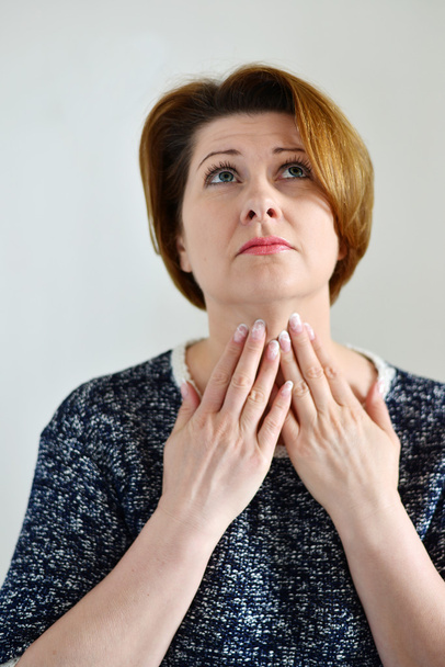 Adult woman with a sore throat  - Фото, зображення