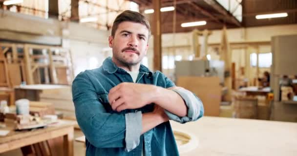 Man, carpenter with face and arms crossed in workshop for wood work, trade and confidence in workplace. Pride, portrait and carpentry career, professional service and artisan with handyman at factory. - Footage, Video