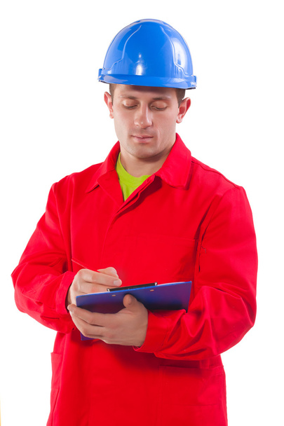 Worker writing on clipboard - Photo, Image