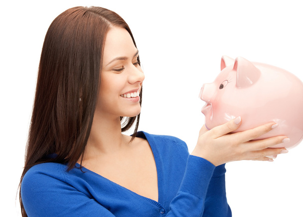 Lovely woman with piggy bank - Zdjęcie, obraz