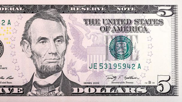 Detail van de vijf Amerikaanse dollar bill close-up. - Foto, afbeelding