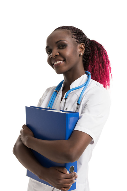 Doctor standing with folder - Photo, Image