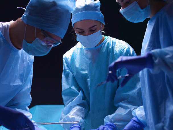 Team surgeon at work in operating room. - Fotó, kép