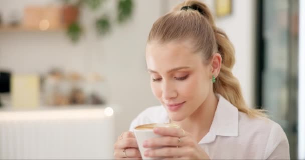 Woman, smell and coffee aroma in cafe for peace, cappuccino and fresh scent for mindfulness. Female person, hot beverage and hospitality in restaurant on weekend, relax and student for inspiration. - Footage, Video