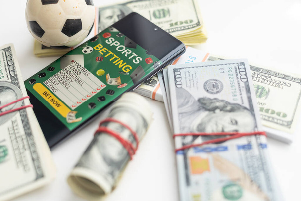 soccer ball over a lot of money. corruption football game. Betting and gambling concept. wold cup. High quality photo - Photo, Image