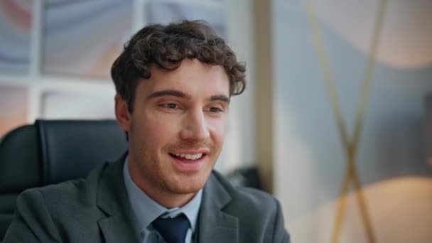 Happy businessman working modern office closeup. Excited smiling director satisfied financial company results winning grant alone. Brunette man reading great news rejoicing success at creative agency - Footage, Video