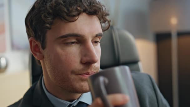 Thoughtful businessman drinking tea at office closeup. Financial professional thinking future resting desk with coffee cup. Experienced boss manager making decision looking distance at workplace  - Footage, Video