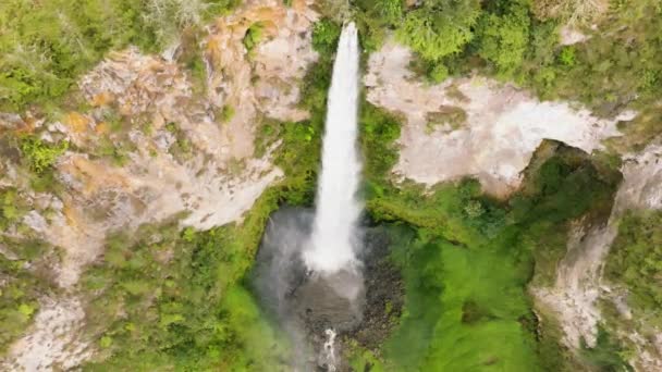Aerial drone of Sipiso Piso waterfall in slow motion in the tropical jungle. Falls in the tropical forest. Sumatra, Indonesia. - Footage, Video