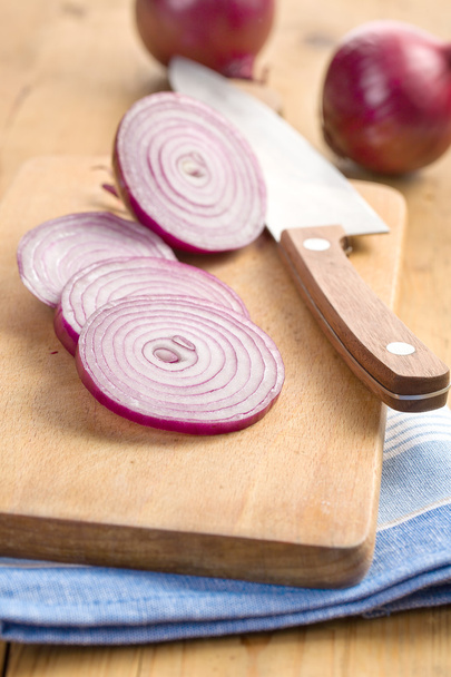 Sliced red onion in kitchen - Photo, image