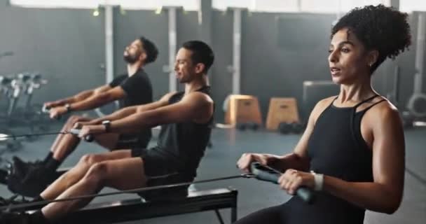 Workout, row machine and female athlete in gym, exercise and portrait with smile. Fitness, class and sports training for wellness in health club, cardio and physical activity for strength and muscle. - Footage, Video