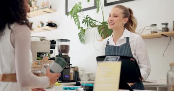 Service, barista or customer with coffee shop or store for drinks or return at checkout counter in a cafe job. Reusable bottle, giving or waitress in small business restaurant with a woman or lady. - Footage, Video