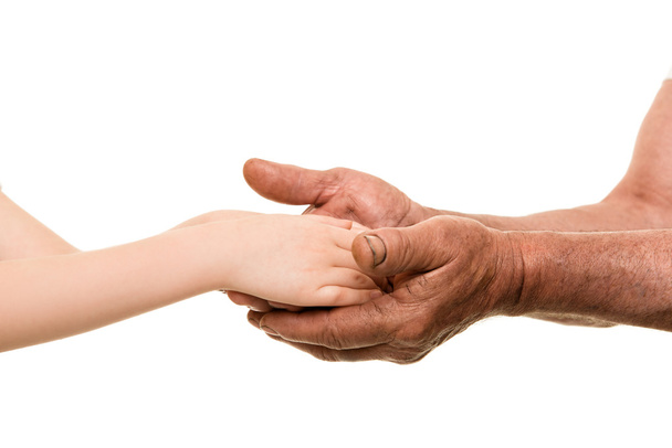 παιδί και γέρος χέρια - Φωτογραφία, εικόνα