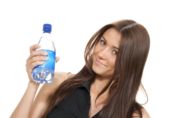 Woman with pure still drinking water - Photo, image