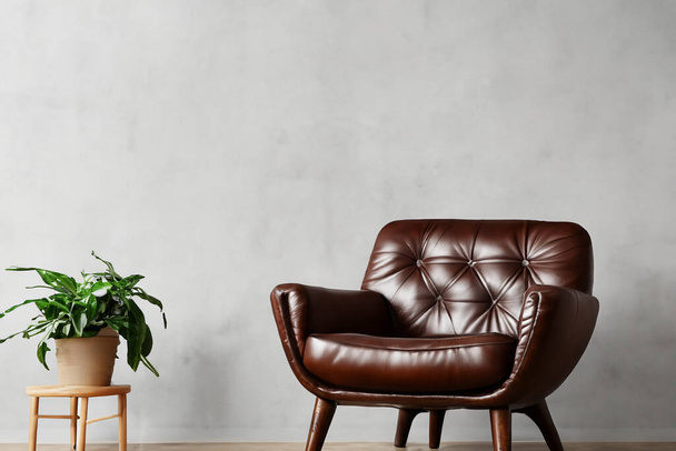 Salón. Salón con sillón de cuero sobre fondo de pared vacío. Interior de la moderna sala de estar con sillón de cuero negro y lámpara. Moderno salón con sofá y mesa de café. - Foto, Imagen