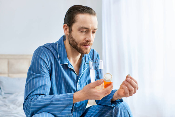 A stylish man taking pills. - Photo, Image