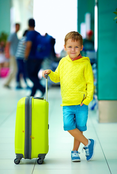 cute boy with luggage in airport, ready for summer holidays - Fotoğraf, Görsel