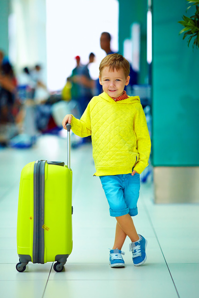cute boy with luggage in airport, ready for summer holidays - Foto, Imagen