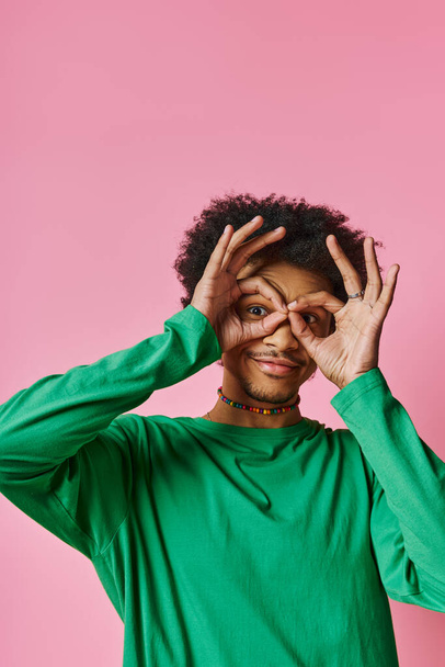 african american man with curly hair covers his eyes with hands. - Photo, Image