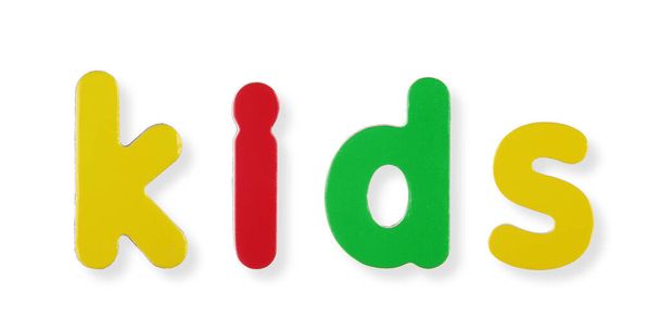 A kids word in coloured magnetic letters on white with clipping path to remove shadow - Photo, Image