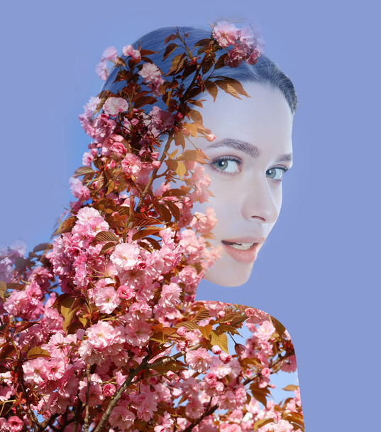 Double exposure of beautiful woman and blooming flowers on blue background - Valokuva, kuva