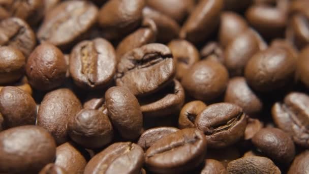 Coffee beans in 360 degree rotating showcase macro shot - Footage, Video