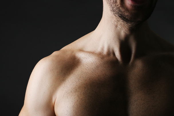 Muscle young man close up - Фото, изображение