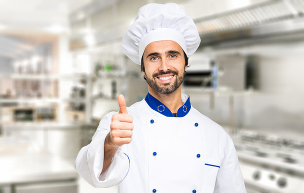 Successful smiling chef - Foto, imagen