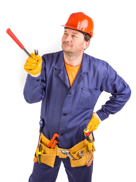 Worker in red protective helmet. - Photo, image