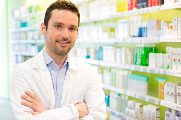 Portrait of an attractive pharmacist at work - Fotó, kép