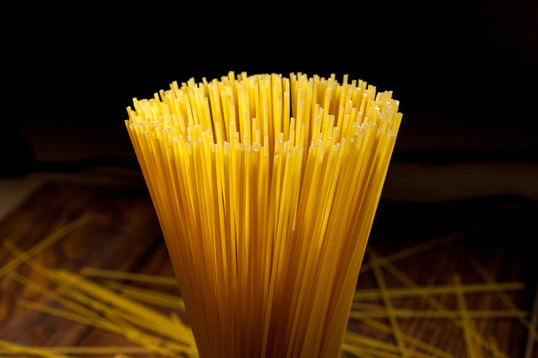 italian spaghetti on black - Foto, Bild