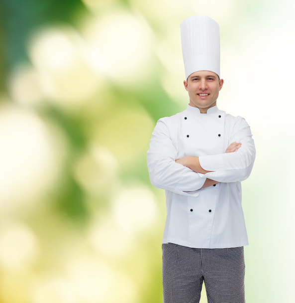 happy male chef cook with crossed hands - Valokuva, kuva