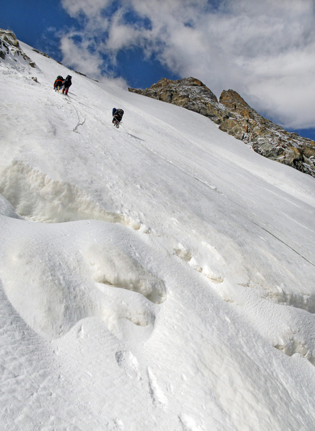 Climbers swarming up the rock - Valokuva, kuva