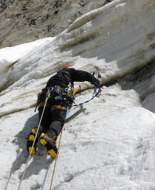 Climber swarming up the rock - Photo, Image