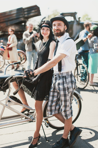 Couple participating in bicycle Retro cruise - 写真・画像