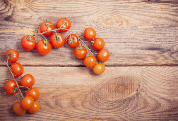 cherry tomatoes on rustic wooden background - Zdjęcie, obraz