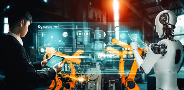 XAI Mechanized industry robot en menselijke werknemer werken samen in toekomstige fabriek. Concept van kunstmatige intelligentie voor industriële revolutie en automatisering productieproces. - Foto, afbeelding