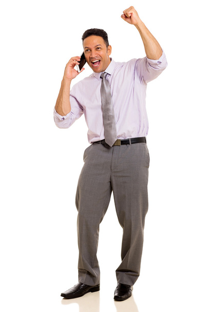 man receiving exciting news over the phone - Photo, Image