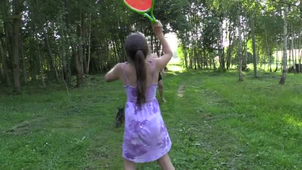 Happy father with daughter play badminton game - Video, Çekim