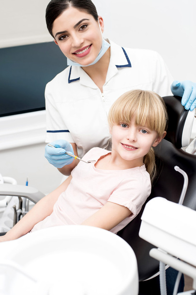 Dental assistant and little girl - Photo, Image