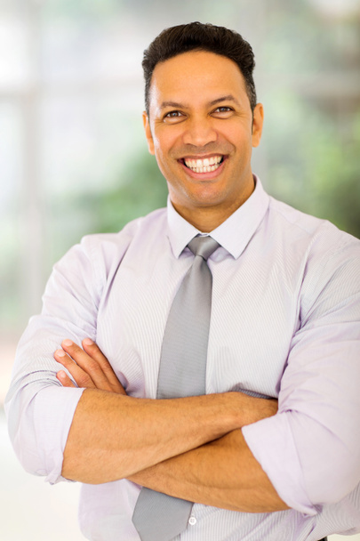 middle aged businessman standing in office - Photo, Image